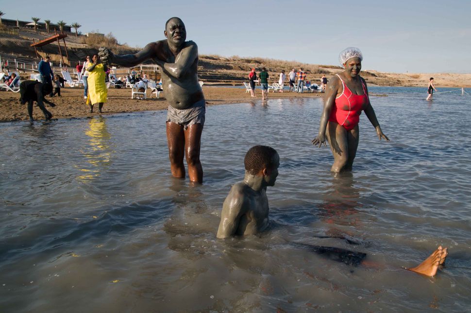 Ugandan bathers at the Dead Sea 2