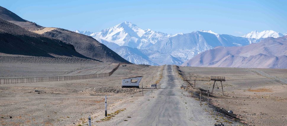 Karakul, road and Chinese border fence