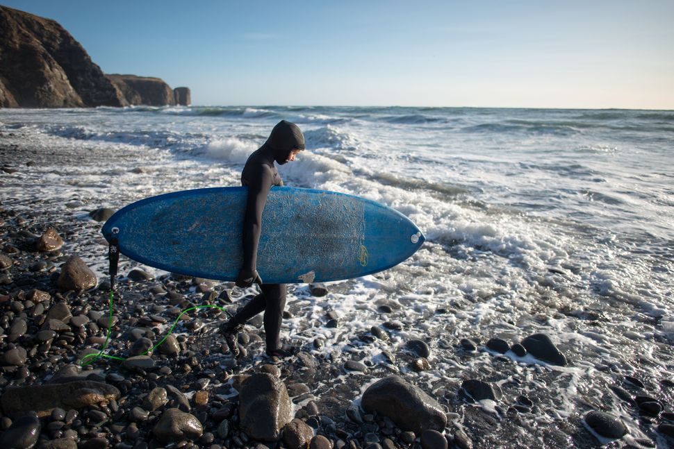 Surfing in Kamtchatka - A brave Russian girl confronts the icy waters of the Pacific in November
